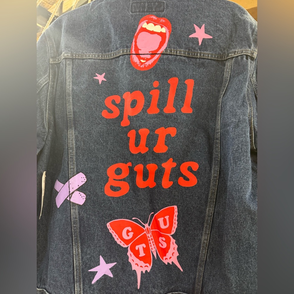 Olivia Rodrigo spill ur GUTS blue denim jacket
